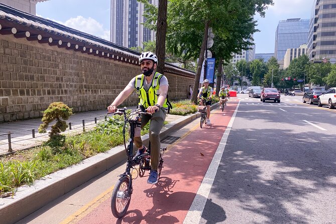 Afternoon E-bike tour and "Happy Hour" food and drinks - How the Cheonggyecheon stops teach Seoul’s modern story
