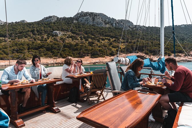 All Day Cruise -3 Islands to Agistri,Moni, Aegina with lunch and drinks included - Moni or Metopi: the swim/snorkel anchor and what lunch feels like onboard