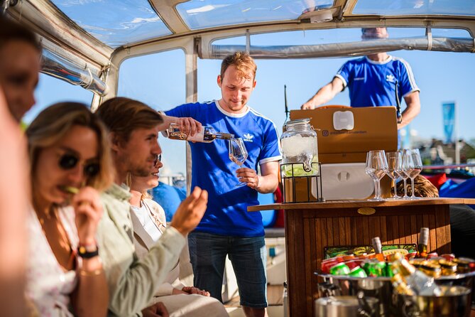 Amsterdam: Canal Booze Cruise with Unlimited Drinks Option - The Host + Captain Factor: Why People Love This Cruise