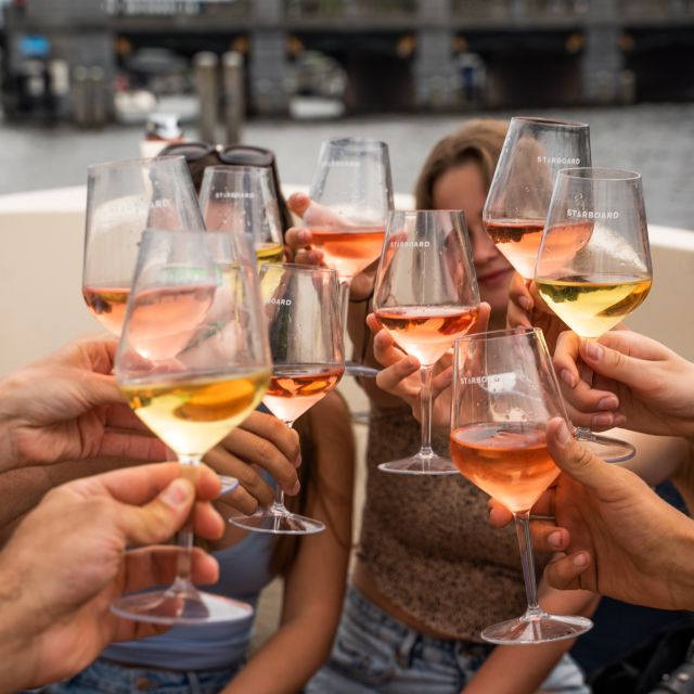 Amsterdam: Private Canal Booze Cruise with Unlimited Drinks - First Steps at Amstel 178 and the Starboard Meeting Point