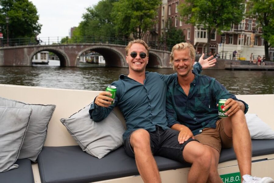 Amsterdam: Red-Light District Pub Crawl and Booze Boat Tour - Key Highlights You’ll Actually Feel in This Amsterdam Night Out