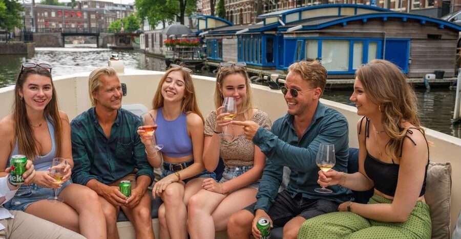 Amsterdam: Red-Light District Pub Crawl and Booze Boat Tour - The 5-Minute Switch: From Boat to Pub Crawl at Black Tiger Bar