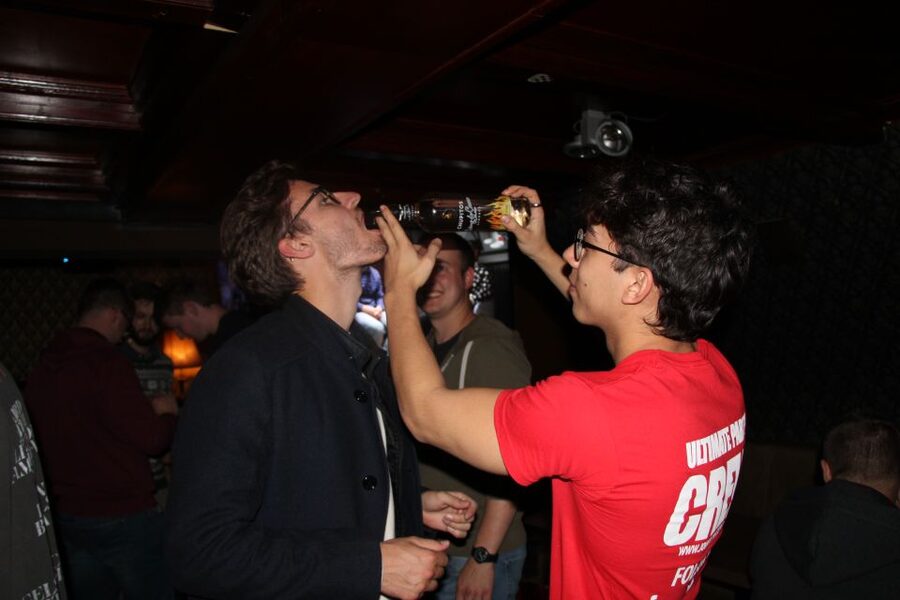 Amsterdam: Red-Light District Pub Crawl and Booze Boat Tour - Meeting Point Etiquette: How to Spot the Right People Fast