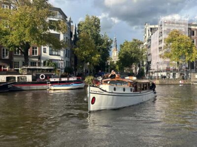 Amsterdam: The Bulldog Boat Smoke and Booze Cruise - The half-open boat experience: great views, real weather