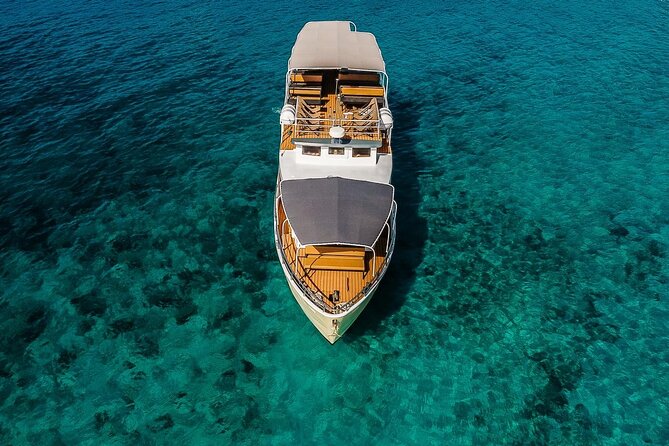 Blue Lagoon and 3 Island Boat Tour with Food and Drinks Included - Blue Lagoon of Drvenik: Clear Water and Snorkeling Value