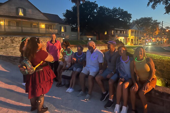 Booze and Boos Haunted St. Augustine Ghost Walking Tour - Bar With No Name: neon skeletons and a Castillo photo moment