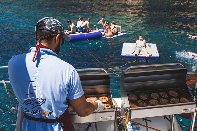 Catamaran trip with other groups along the Costa Brava. Saturday. - On-Board BBQ: What You Eat, When, and Why It Matters