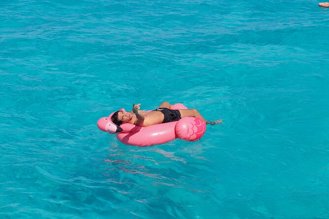 Dancer Cruise Isla Mujeres Snorkel Food and Drinks Included - Waterslide and Trampoline Fun: The 30-Minute Escape Into Chaos (In a Good Way)