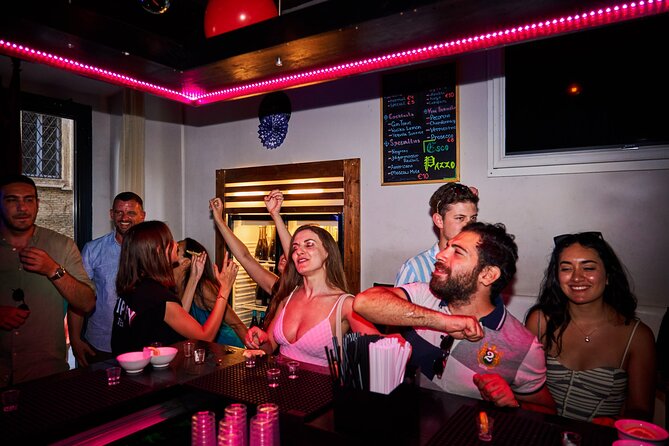 Lisbon Pub Crawl Walking Tour with Drinks Included - Stop 1: Largo do Carmo and the Icebreaker Drink
