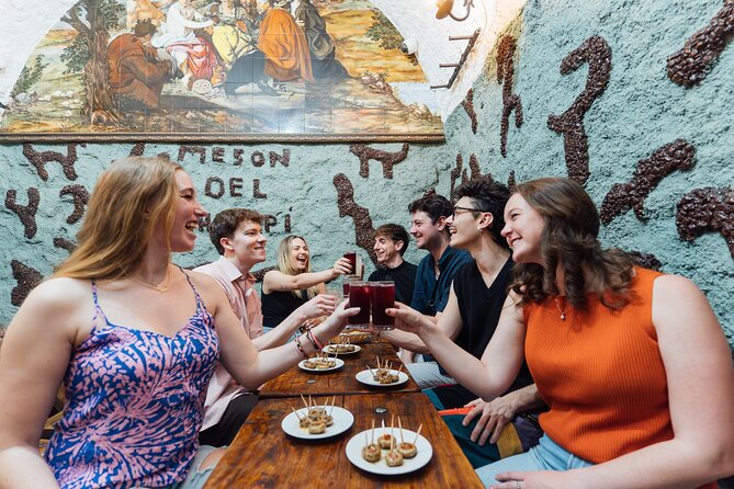 Madrid: Tapas Walking Tour with Food and Drinks Included - Calle de la Cava Baja: The Meaning of La Hora del Vermut