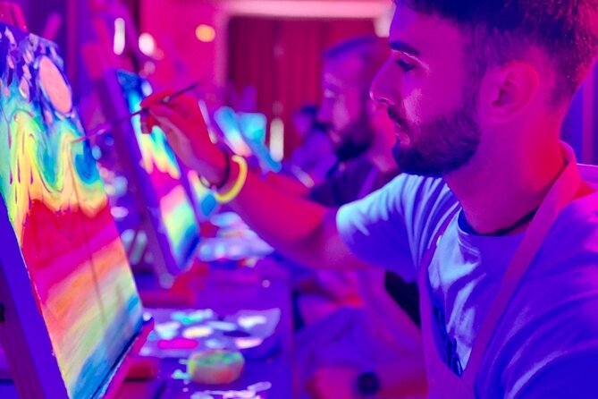 Paint a neon fluorescent picture while drinking unlimited wine - Neon Wine Painting in Valencia: What the 2 Hours Feels Like