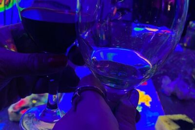 Paint a neon fluorescent picture while drinking unlimited wine - Where You Meet on Carrer del Bisbe Jaume Pérez (and how the timing works)