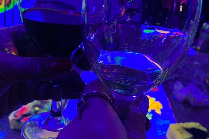 Paint a neon fluorescent picture while drinking unlimited wine - Where You Meet on Carrer del Bisbe Jaume Pérez (and how the timing works)