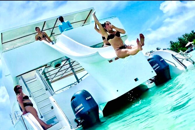 Punta Cana Booze Cruise, Snorkeling, Bar Entertainment Open Bar - Sandbar natural pool time: floating water pad and a water slide