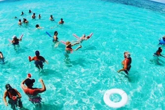 Punta Cana Booze Cruise, Snorkeling, Bar Entertainment Open Bar - The Natural Pool off Bávaro Beach: the “party meets water” moment