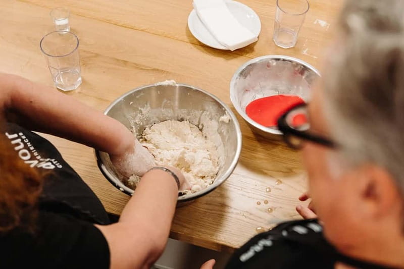 Rome: Pizza Making Class with Gelato & Drinks Included - Hands-on dough stretching: your turn at the counter