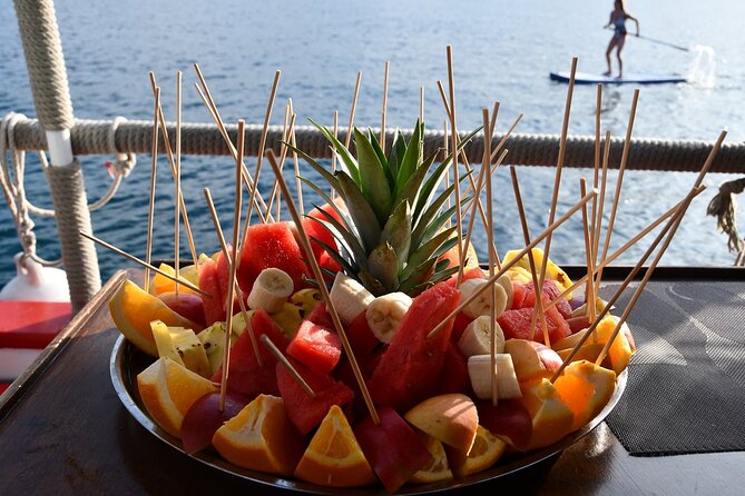 Sunset Cruise VIP (snorkeling, paddle board, & drinks Included) - Sant Antoni sunset hour in front of Café del Mar and Café Mambo