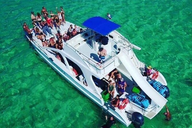 VIP Private Booze Cruise with Live Dj and BBQ in Punta Cana - Stop 2: Playa Bibijagua open bar, Caribbean music, and big-coast views