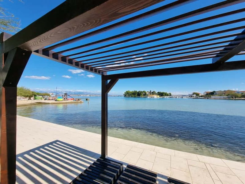 Zadar: Private SpeedBoat Tour to Islands - Drinks Included - Preko and Jaz beach: cafes, souvenirs, and a real island pace